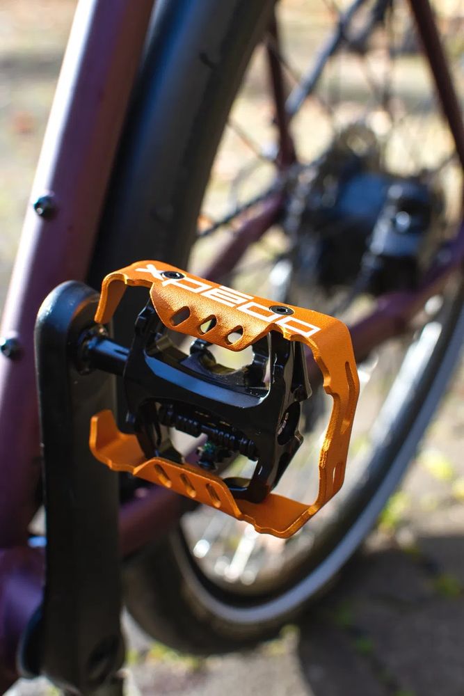 Xpedo Clipless Pedal Milo, schwarz/orange